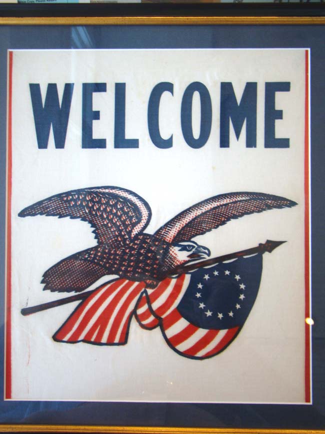 A patriotic linen "Welcome" banner made circa 1918-1920